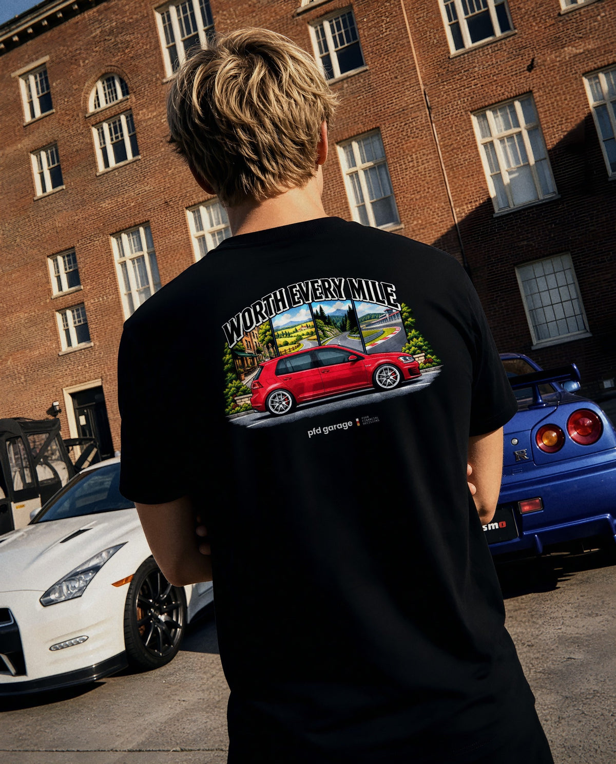 Worth Every Mile MK7 tee in black, worn on a drive